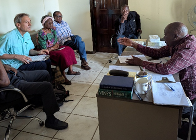 Ken meeting with the Toka-Leya committee to work through difficult issues