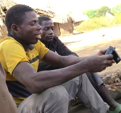 Young men listening to audio Bibles